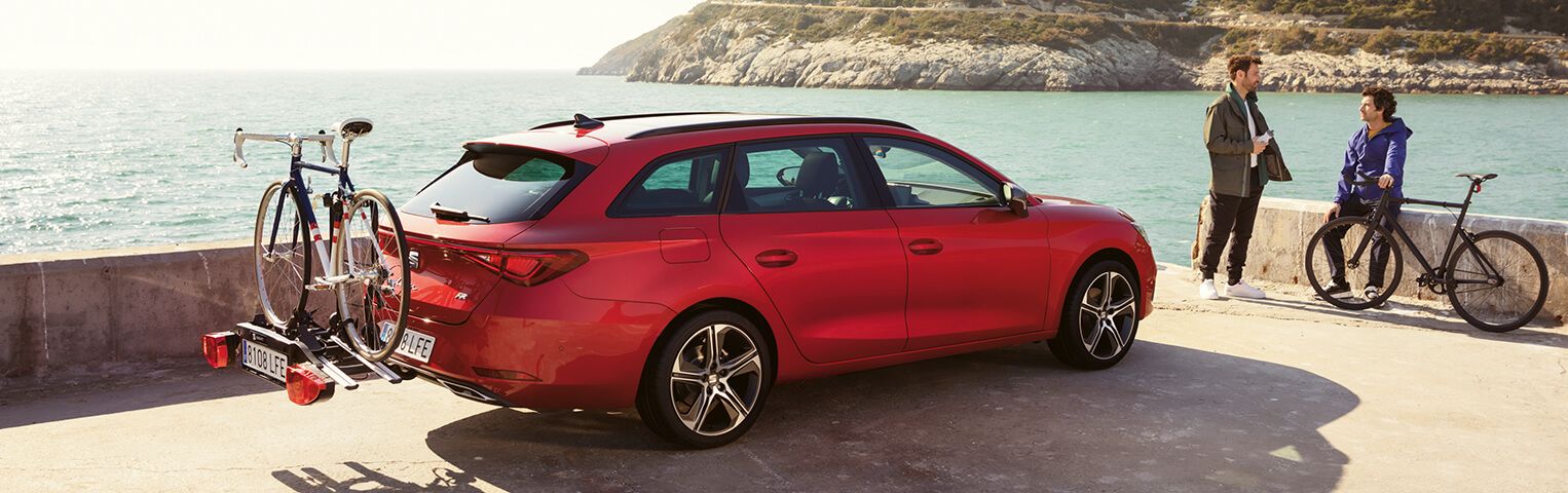 side view of seat leon estate with bikes on the back